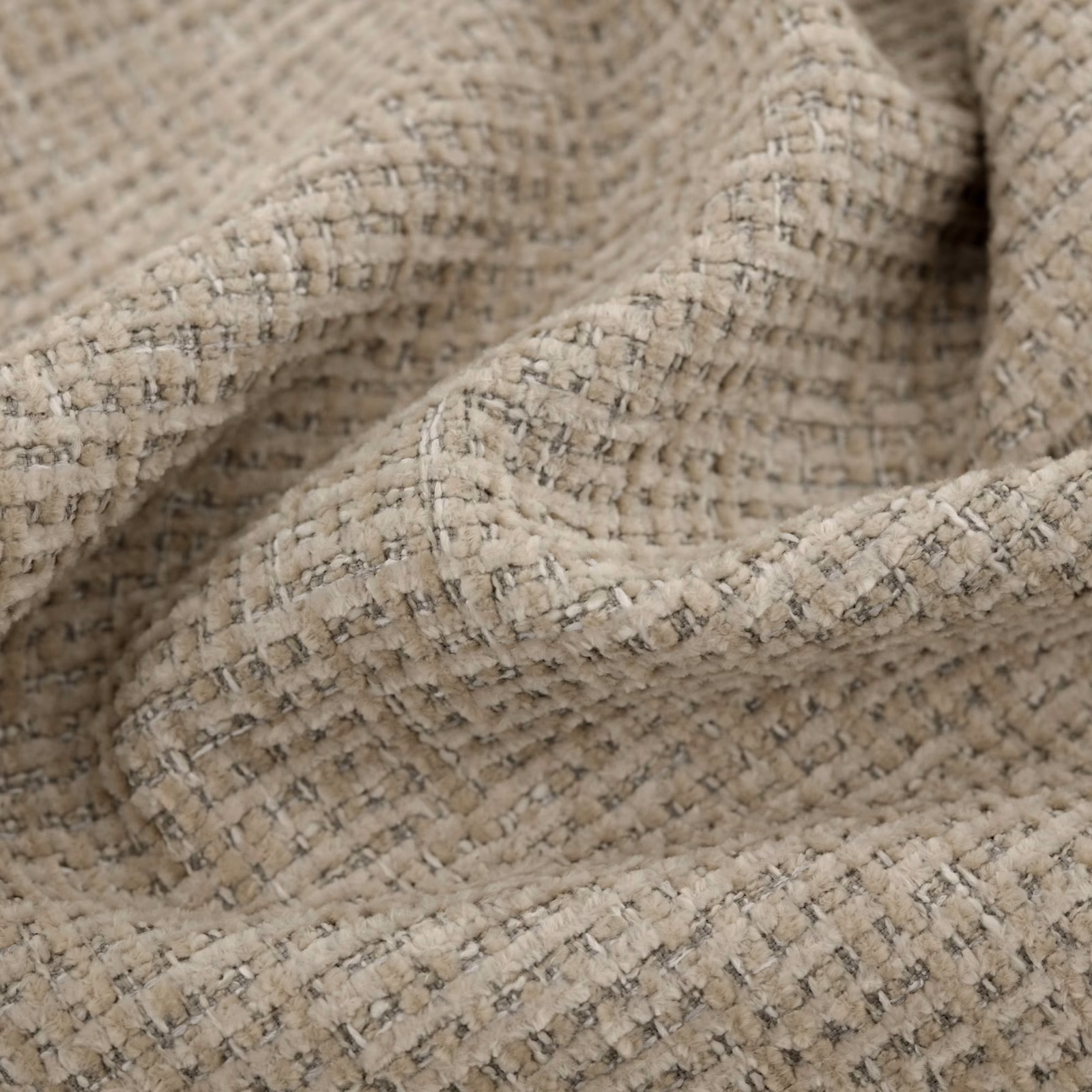 Warm oatmeal woven textile with charcoal flecks and raised nubby texture