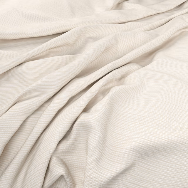 Soft vanilla ivory fabric with fine ribbing gathered into flowing folds