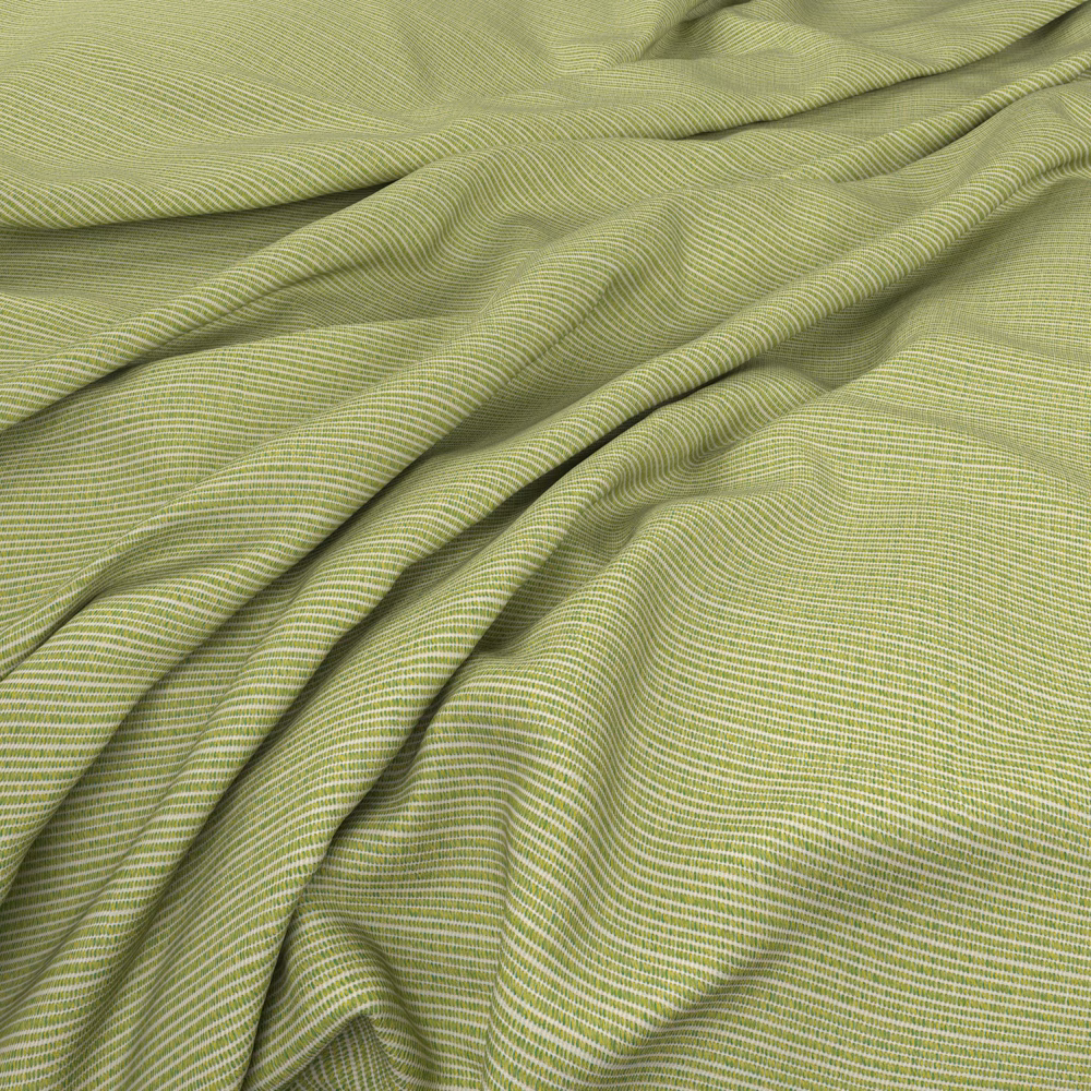 Gathered muted wasabi-green fabric with fine horizontal ribbed texture and soft folds