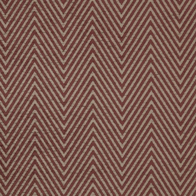Close-up of a muted red and beige chevron woven upholstery fabric