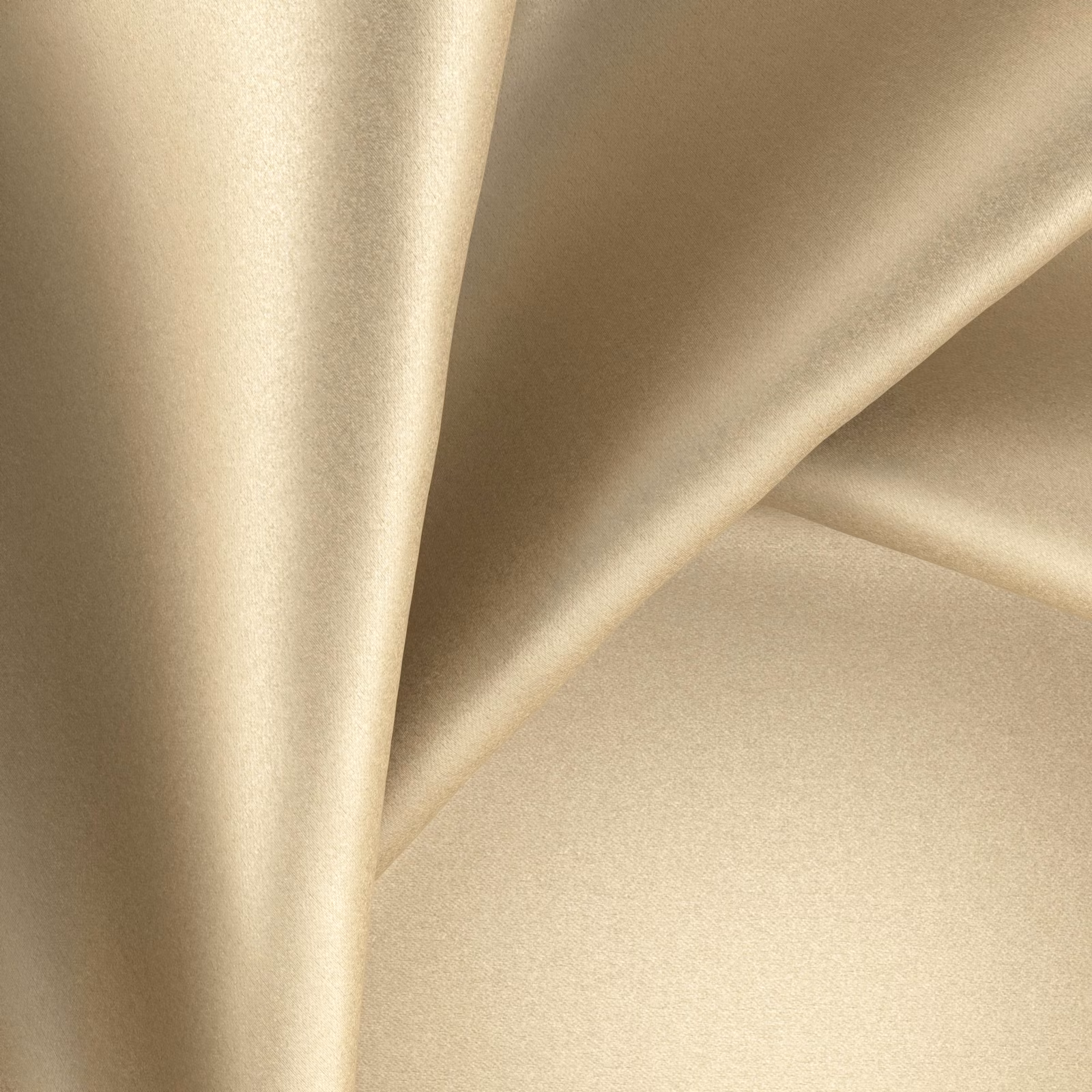 Warm brass-gold fabric with smooth satin sheen folded into fluid sculptural drapes