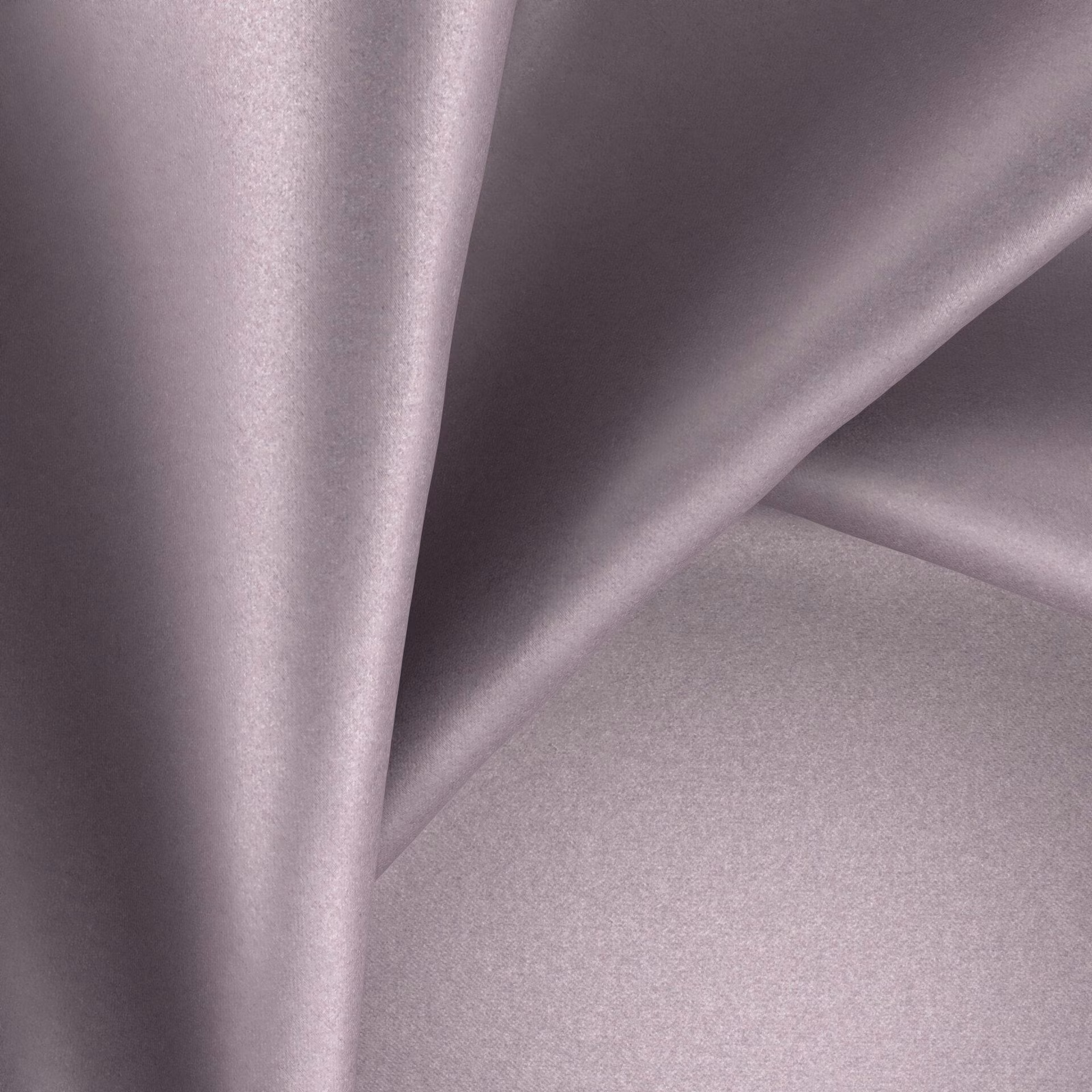 Dusty mauve-lilac plain fabric with a smooth reflective surface in soft folds