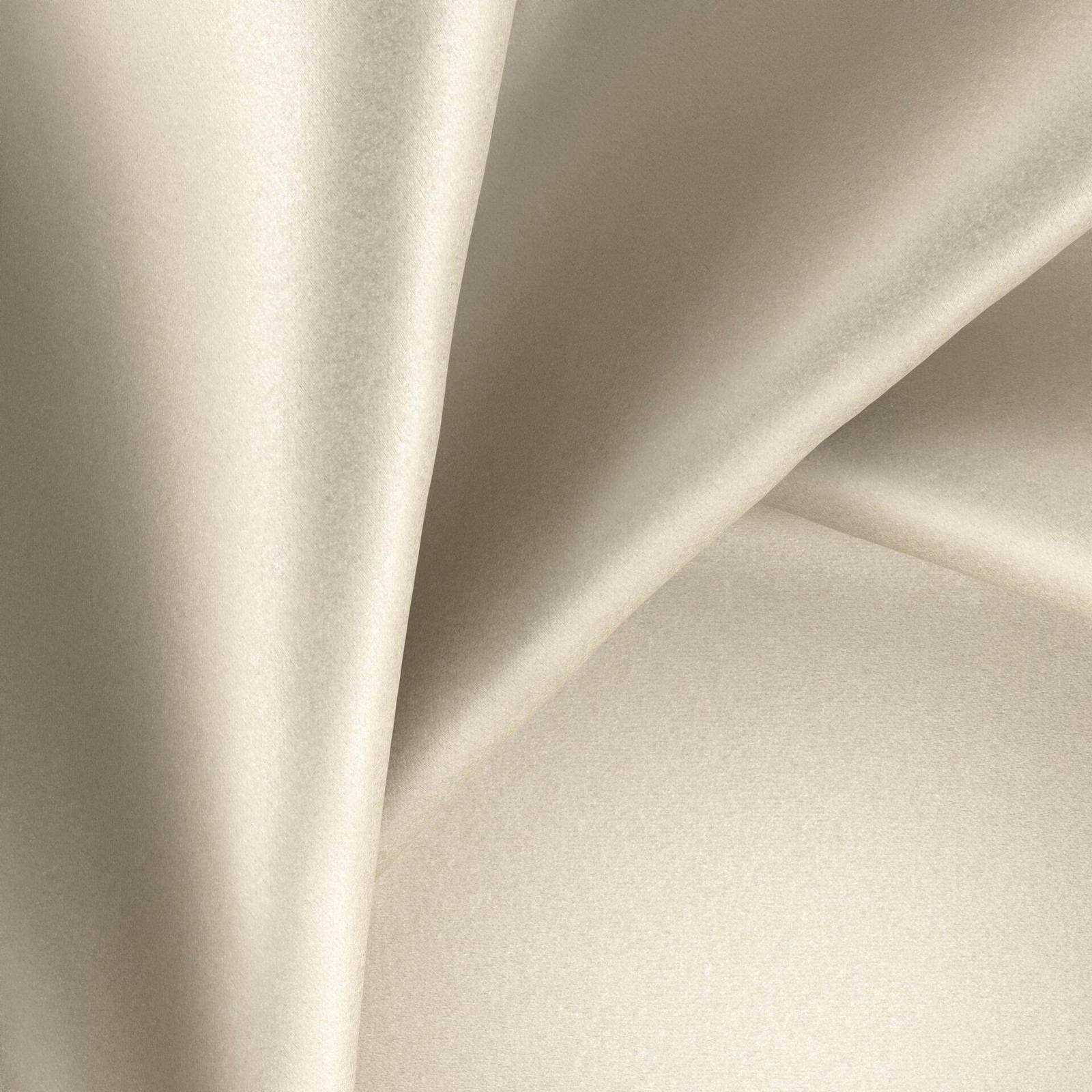 Pale warm ivory Glossy Luna fabric falling in smooth, lustrous folds