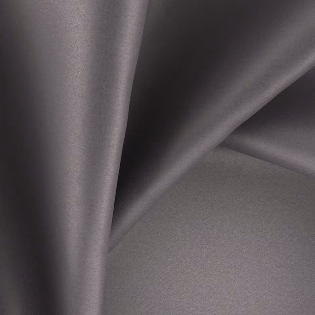 Smoky mercury-grey fabric with subtle satin sheen in broad flowing folds