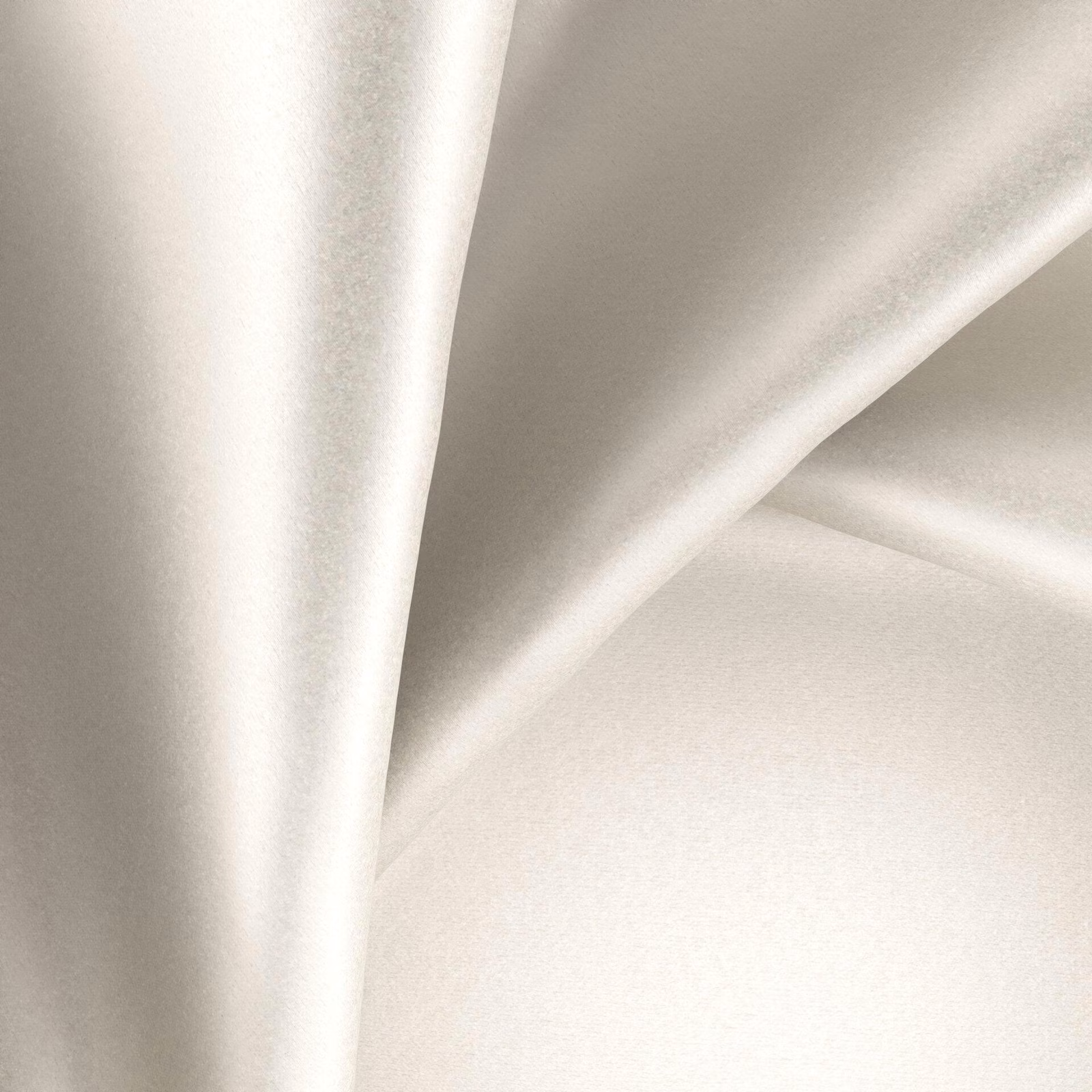 Pale pearl ivory fabric with a smooth glossy surface falling in fluid folds