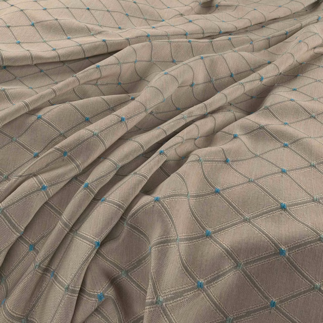 Taupe-grey woven trellis with turquoise pinpoints gathered into soft folds