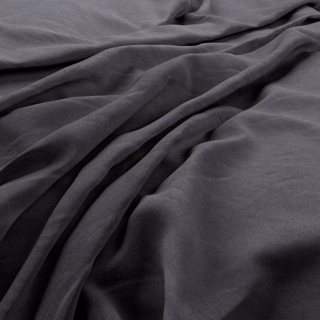 Deep airforce-grey plain textile with fine weave and softly gathered folds