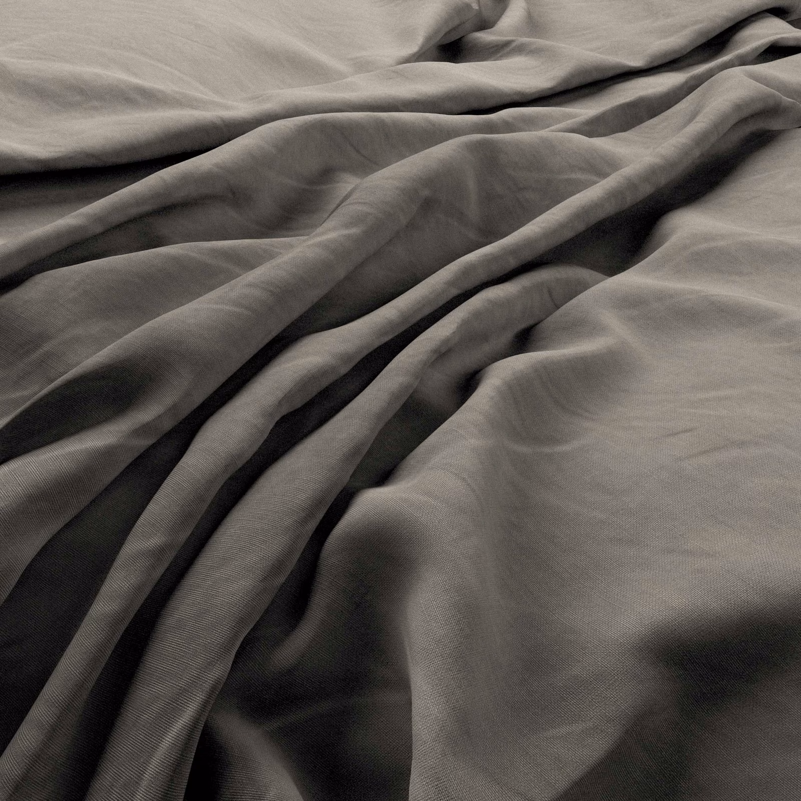 Andesite heavy linen in charcoal taupe, shown in soft folds with a fine plain weave.