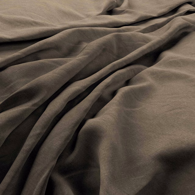 Warm taupe-brown Heavy-Linen fabric gathered into softly textured flowing folds
