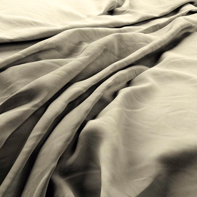 Warm ivory fabric with fine ribbed weave in deep sculptural folds