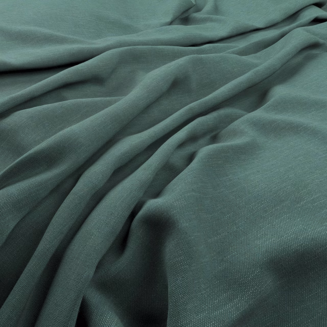 Deep Amazon teal-green fabric with fine weave gathered into soft folds