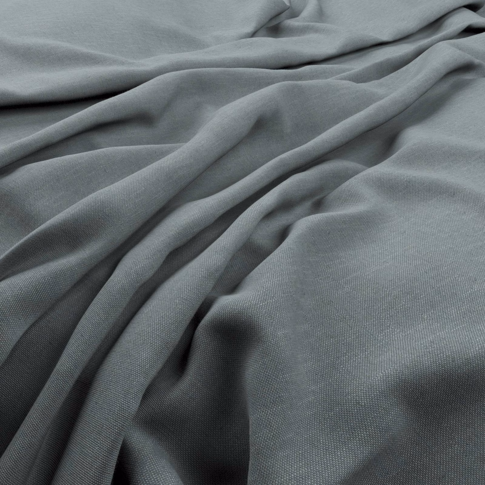 Muted blue-grey Husk textile gathered into soft folds with a fine even weave