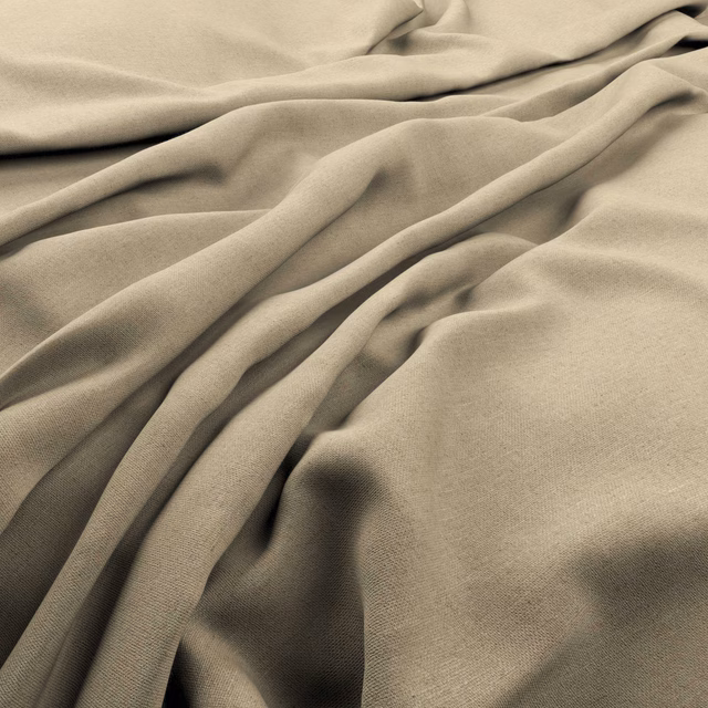 Warm flax-beige plain weave falling in soft, shadowed folds