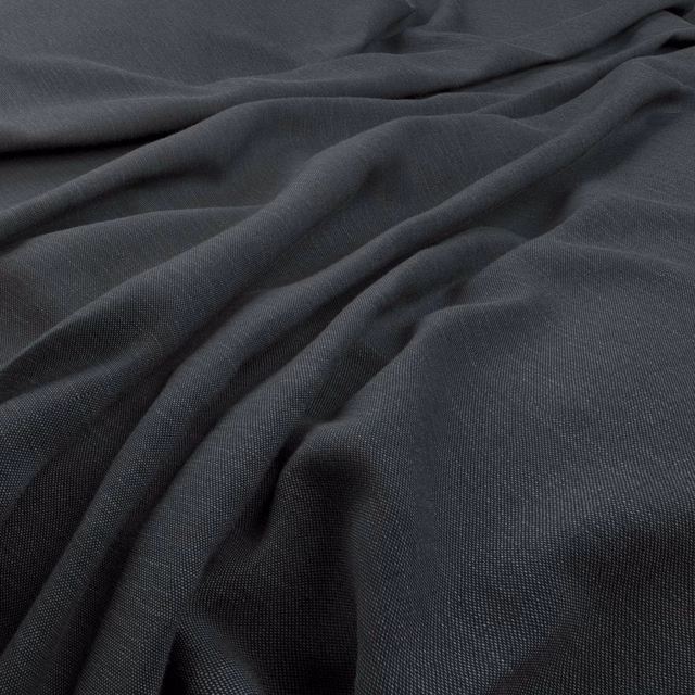 Deep graphite-grey fine weave gathered into softly reflective fabric folds