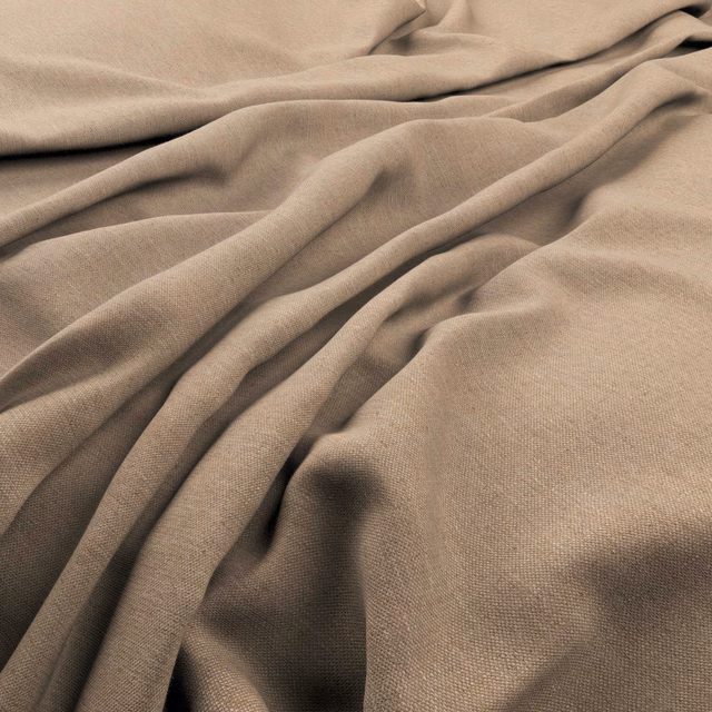 Warm limestone-taupe plain weave gathered into deep, softly shadowed folds
