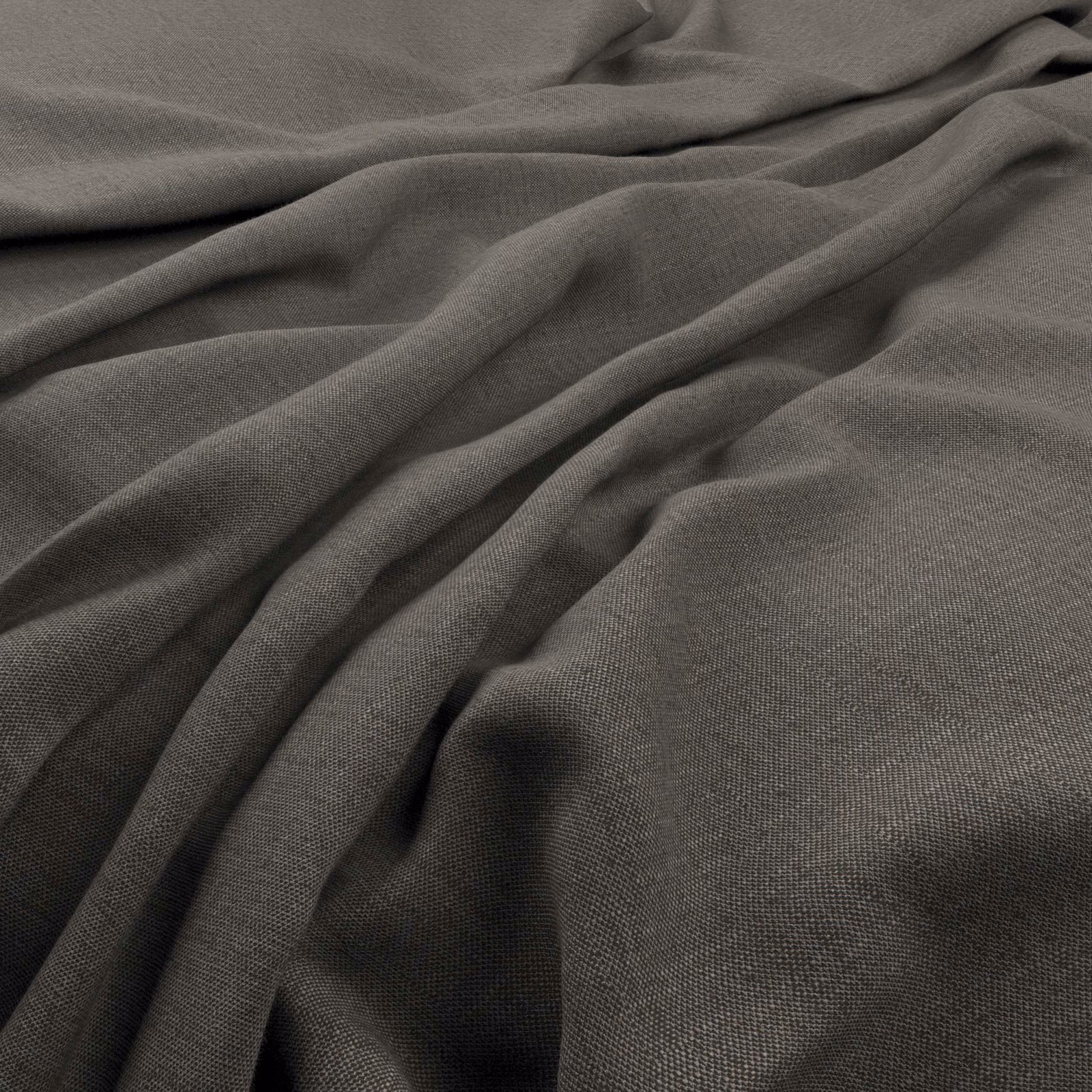 Charcoal taupe finely woven fabric gathered into soft, shadowed folds