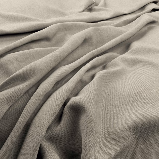 Taupe-grey plain weave fabric draped in soft folds with a fine surface texture