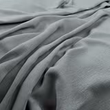 Cool sea-grey blue plain weave gathered into soft, fluid folds