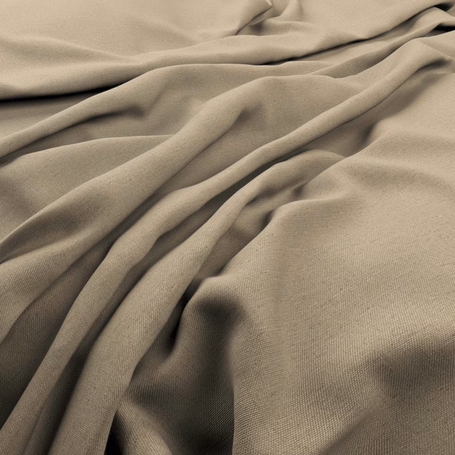 Warm sesame beige plain weave falling in soft, shadowed fluid folds