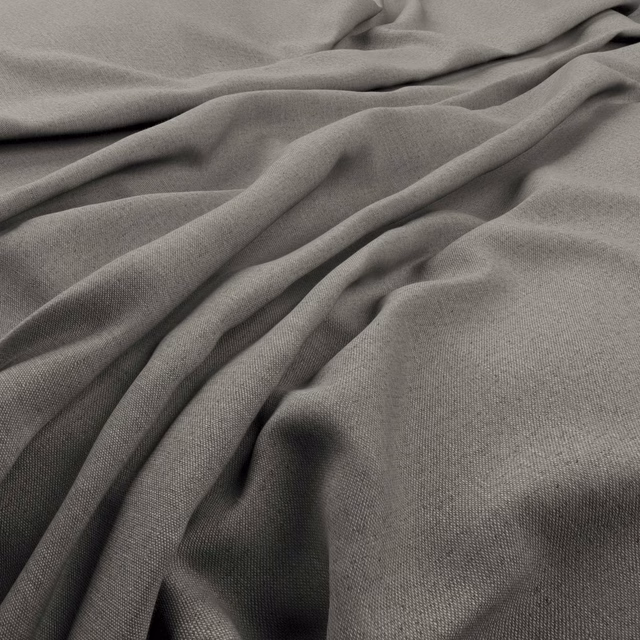 Shadow-grey fine weave gathered into soft, sculptural folds