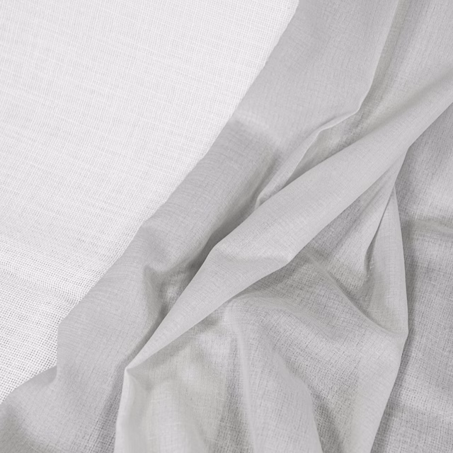 Pale silver-grey fabric with a fine crosshatched weave draped in soft folds