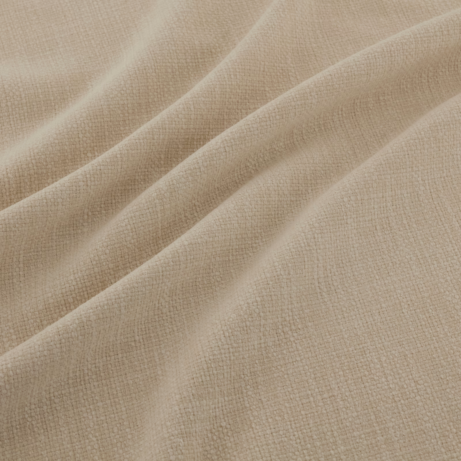 Warm buff beige fabric with fine crosshatch weave gathered into soft folds
