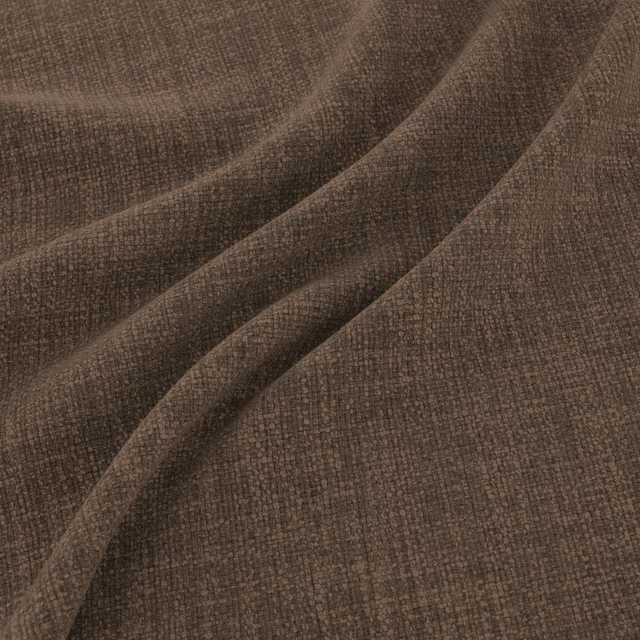 Chestnut-brown woven fabric with charcoal flecks and soft folded ridges