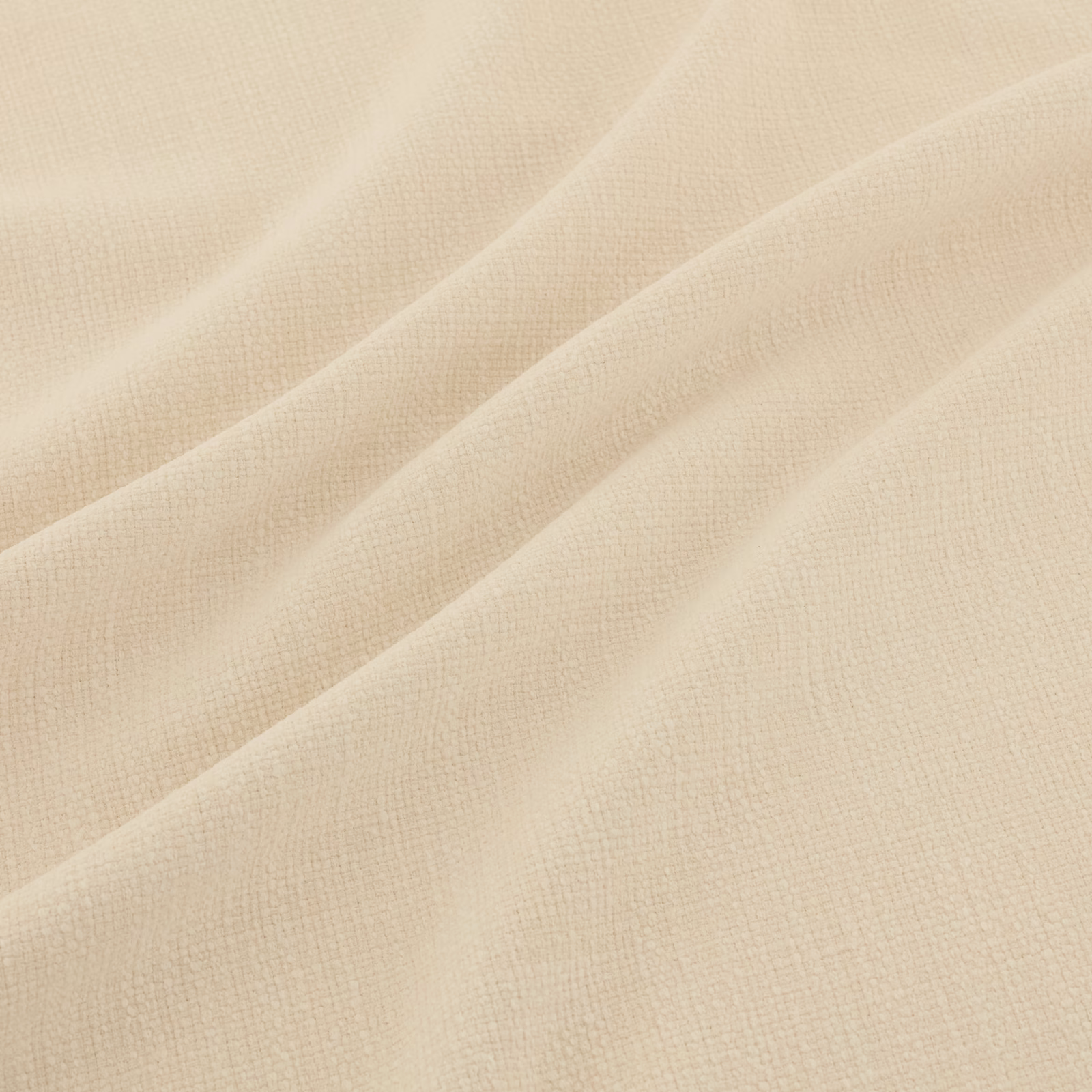 Warm ecru fabric with a fine crosshatched weave arranged in soft flowing folds