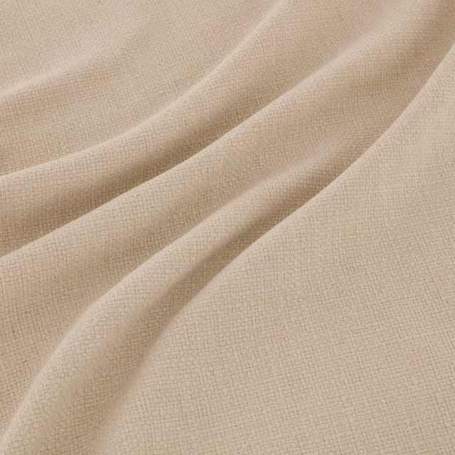 Pale feather-beige fabric with fine crosshatch weave draped in soft folds