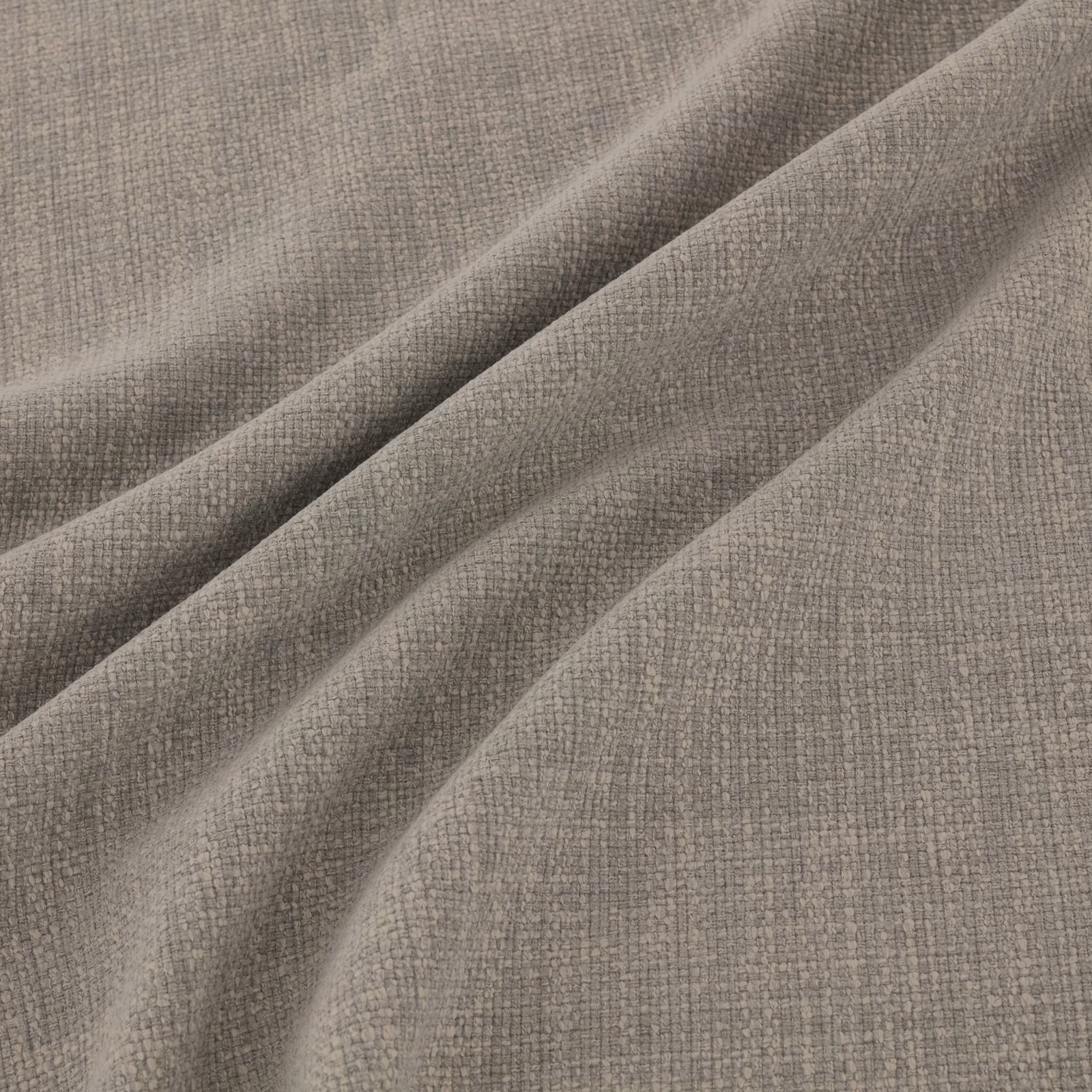 Soft limestone taupe fabric with fine crosswoven texture arranged in fluid folds