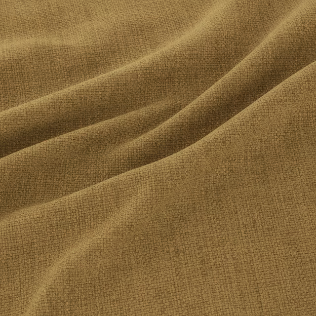 Muted ochre-gold woven fabric with fine texture gathered into soft diagonal folds