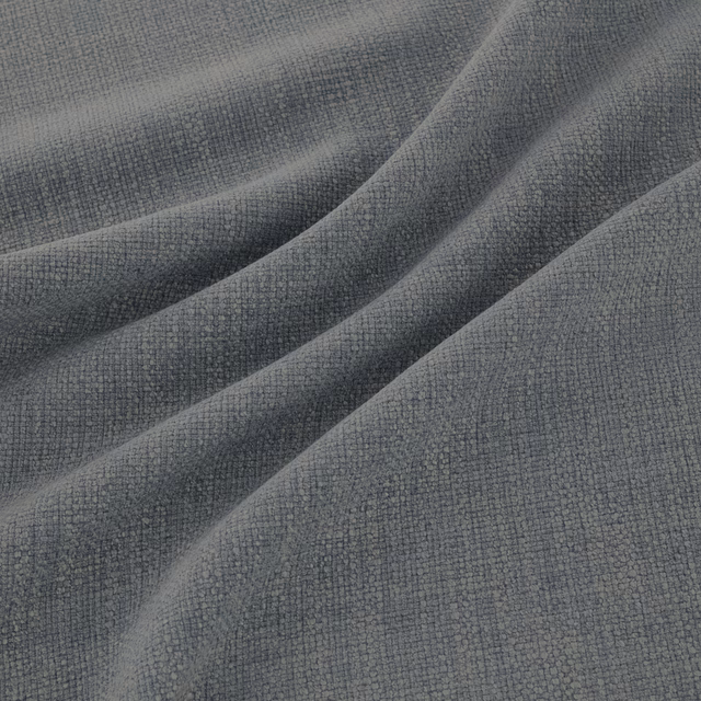 Muted blue-grey Jaeger fabric showing a fine nubby weave across soft folds