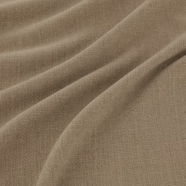 Warm praline taupe fabric with fine crosshatch weave and soft diagonal folds