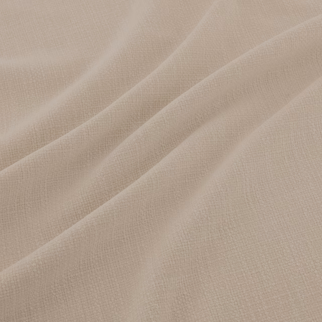 Pale pumice taupe fabric with fine crosshatch weave falling in soft diagonal folds