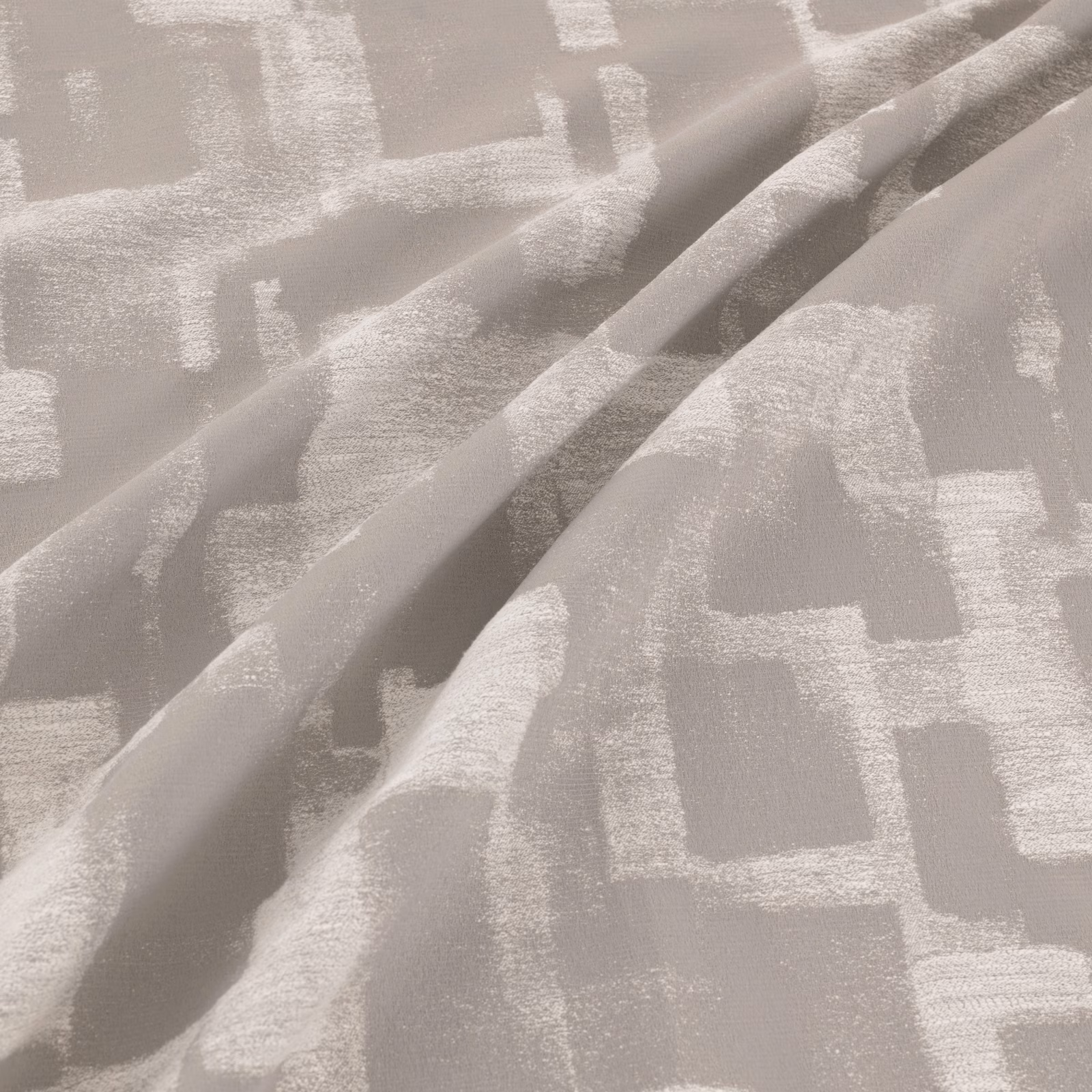 Steel-grey abstract geometric fabric with softly brushed texture folded into broad ripples