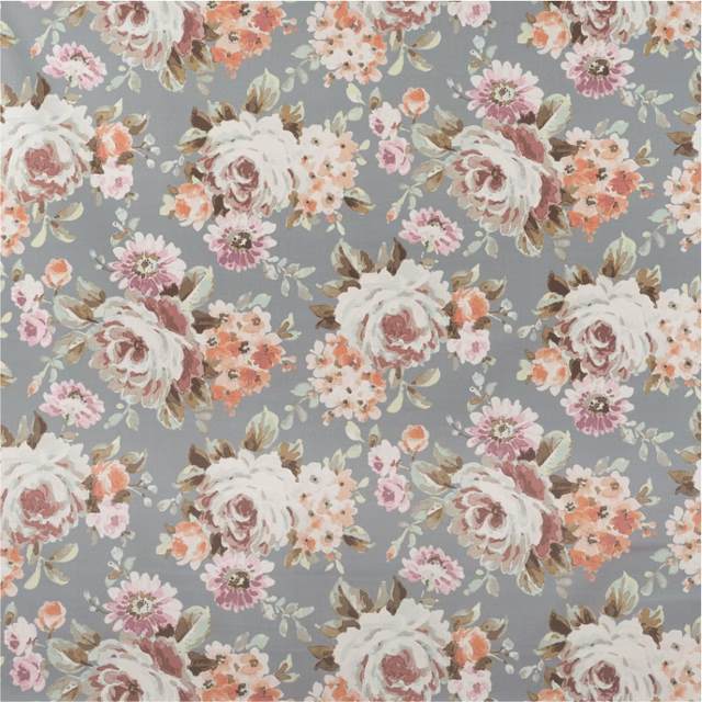 Dusty blue-grey floral fabric with ivory roses, blush blooms and coral accents