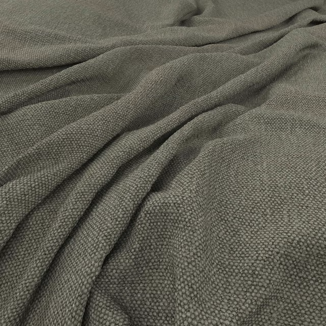 Muted basil-green fabric with a small nubby weave gathered into soft folds