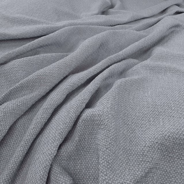 Cool dove-grey Jumbo fabric with fine pebbled weave arranged in soft folds