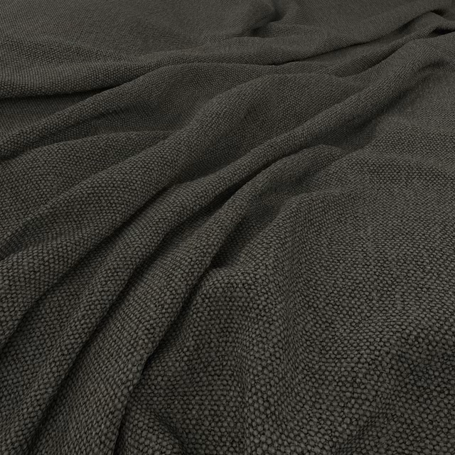 Deep forest-green woven swatch with nubby texture and charcoal-shadowed folds