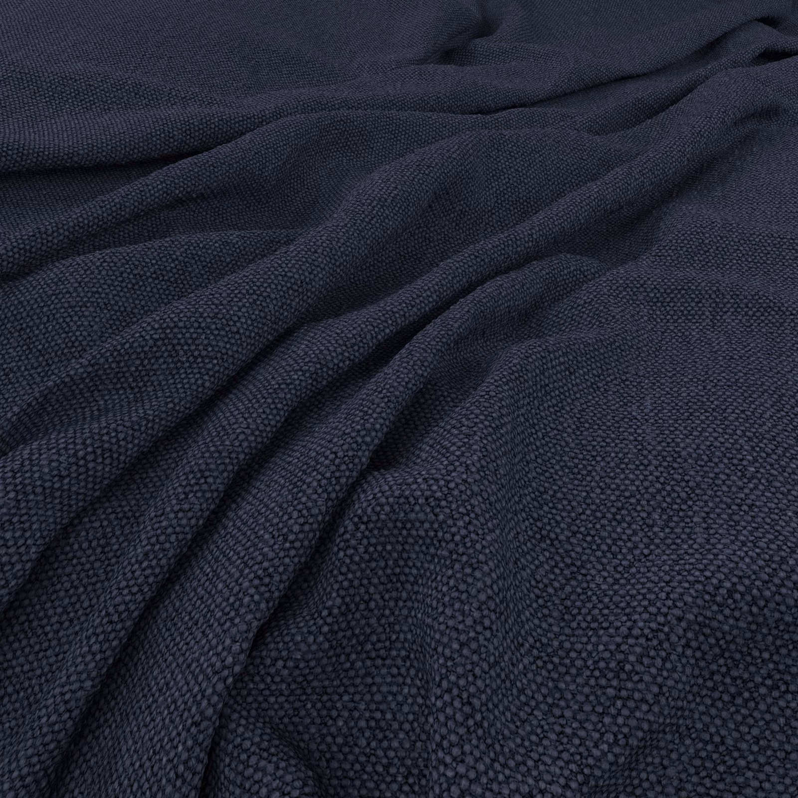 Deep indigo fabric with a finely pebbled weave draped into soft folds