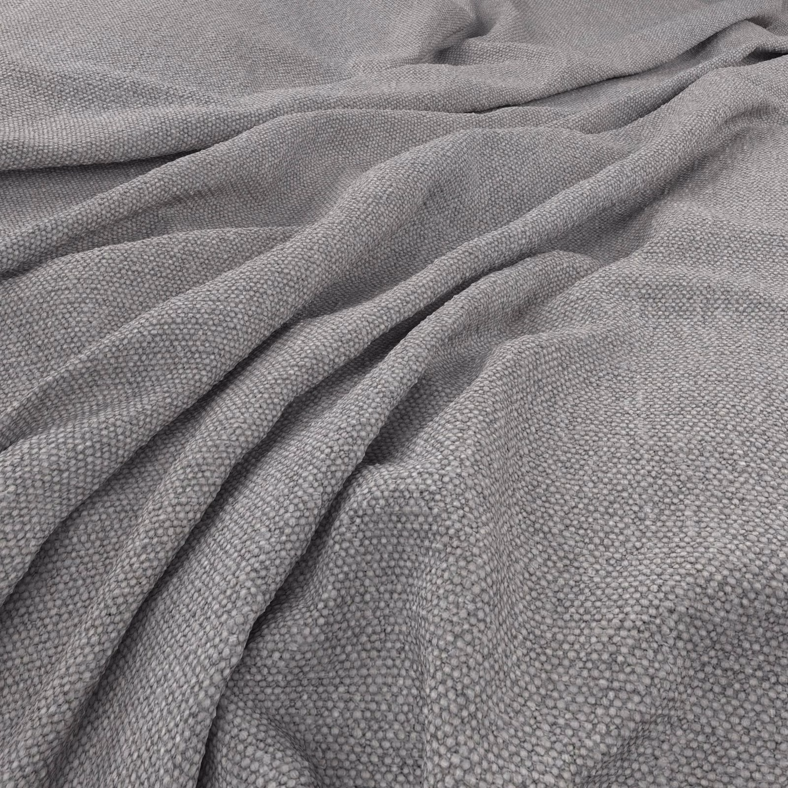 Soft mid-grey woven fabric with fine pebble texture arranged in loose folds