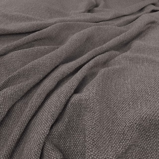 Smoky taupe-grey fabric with a dense pebble-textured weave in soft draped folds