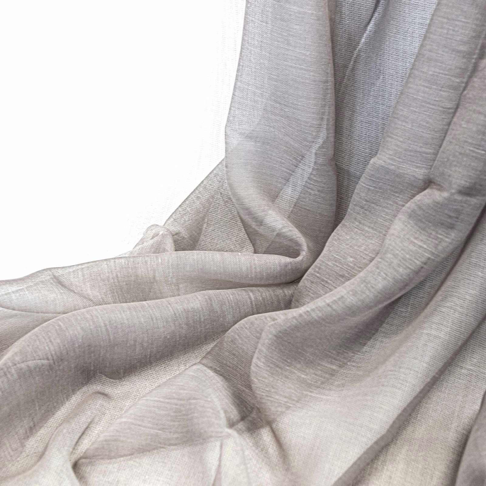 Soft silver-grey woven fabric draped in fluid folds with subtle fine texture