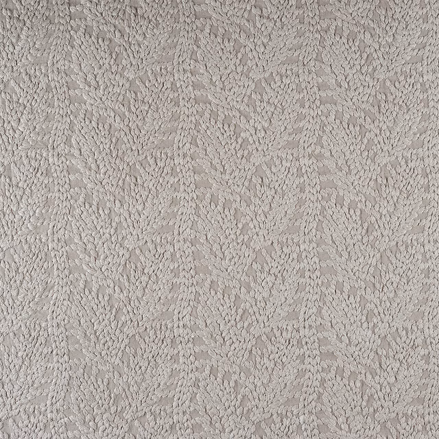 Pale khaki-taupe fabric with raised, irregular organic textured pattern