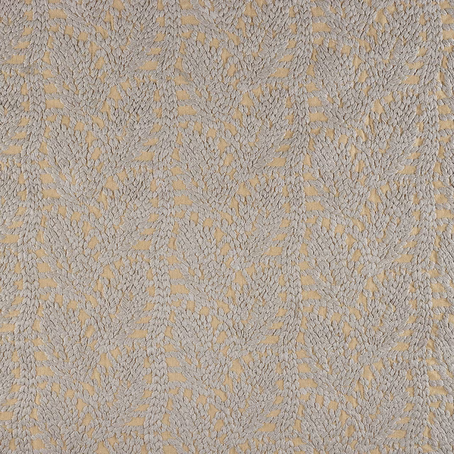 Warm taupe woven swatch with ochre flecks and an irregular organic motif