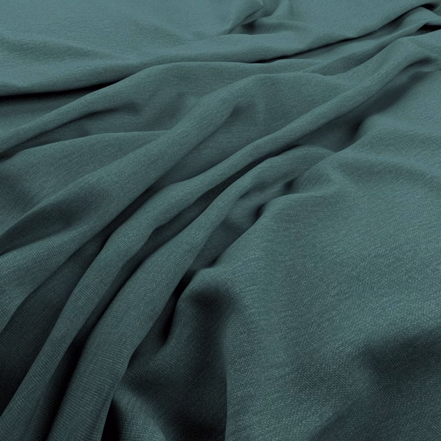 Deep Atlantic teal fabric with fine woven texture gathered into soft flowing folds
