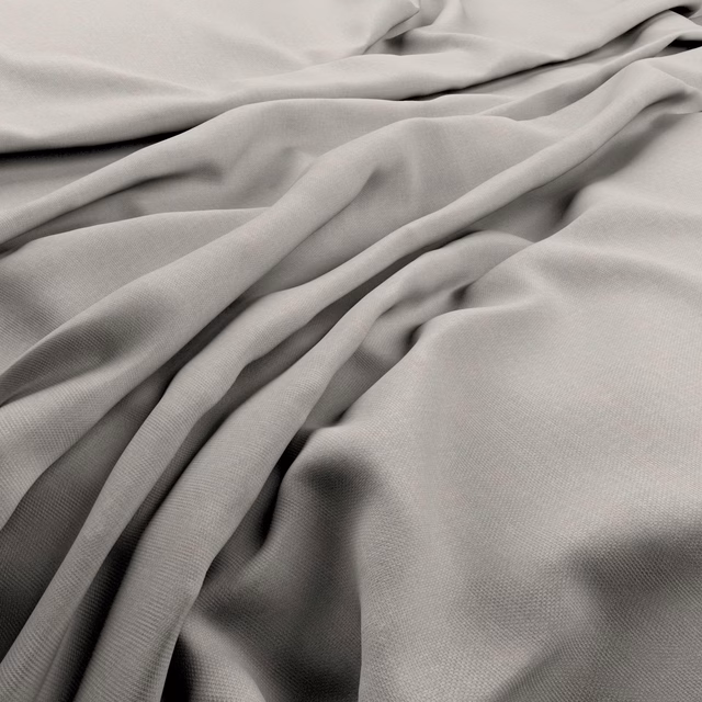 Frost-grey fabric with fine grain, gathered into soft flowing folds