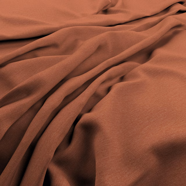 Warm pumpkin terracotta cloth with a fine weave gathered into fluid folds