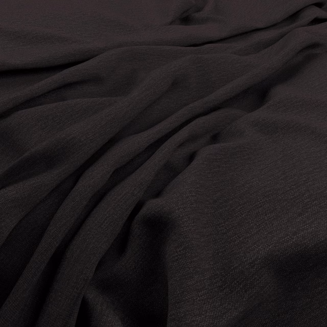 Deep charcoal slate textile with fine weave and softly pooled folds