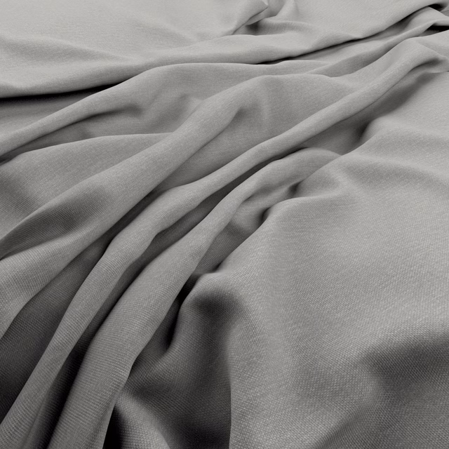 Cool zinc-grey fine weave fabric arranged in softly rippled folds